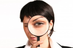 woman with magnifying glass